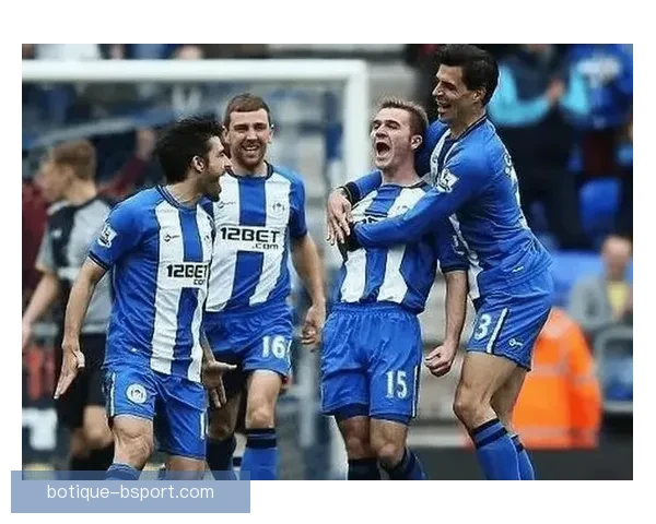 卢顿足球队遗憾降级英超无缘新赛季，重返英冠联赛争取再度崛起